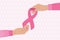 Breast Cancer Awareness Month. Female hands give and take pink ribbon. Nobody fights alone. Cancer prevention and women health