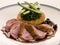 Breast of Duck, with Rosti Potato and Cassis Jus