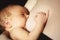 Breast-feeding. mother feeds newborn baby with breast