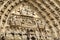 Breath-taking detail in stone carvings of apostles over doors, Notre Dame Cathedral,Paris,France,2016