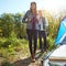 Breathe some fresh air. an adventurous young couple at their campsite.