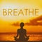 BREATHE yoga inspirational title on sunset beach background woman meditating in lotus pose yoga meditation at sunset