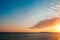 A breathless capture of the golden hour in Colonia Del Sacramento, Uruguay with a view to Rio De La Plata with birds flying