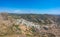 Breathtaking aerial panoramic view over Chora, Kythera by the Castle at sunset. Majestic scenery over Kythera island in Greece,