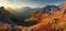 A breathtaking autumn vista of mountains stretching out in a panorama