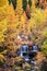 Breathtaking beautiful autumn landscape with waterfall in the Dolomites, South Tyrol, Alps, Italy. Meditation, rest, calm, anti-