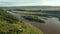 Breathtaking bird`s eye view of the Dniester river with small islands. Cinematic drone shot