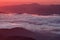 Breathtaking cloud sea at sunrise - dawn, Ceahlau Mountains, Romania