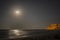 A breathtaking coastal scene with full moon