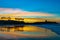 Breathtaking colorful sunset cloudscape over the beach of a tropical island