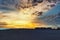 Breathtaking colorful sunset sky over an empty beach