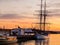 Breathtaking golden sky over the harbour. Oslo, Norway.