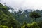 Breathtaking Green Landscape with Foggy Mountains and Waterfalls during Monsoon in Nepal