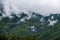 Breathtaking Green Landscape with Foggy Mountains and Waterfalls during Monsoon in Nepal