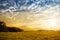 Breathtaking lansdcape of Austrian countryside on sunset. Dramatic sky over idyllic green fields of Anstrian Central Alps on autum