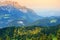 Breathtaking lansdcape of mountains, forests and small Bavarian villages in the distance. Scenic view of Bavarian Alps with majest