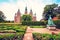 Breathtaking magical landscape with statue of Queen Caroline Amalie in the park of famous Rosenborg Castle in Copenhagen, Denmark