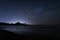 Breathtaking night landscape on Genovese beach in Andalusia, Spain with stars in the sky