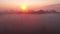 Breathtaking panoramic view of the foggy terrain in the morning light. Filmed in UHD 4k video