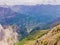 Breathtaking panoramic view of the Grlo Sokolovo gorge in Montenegro. In the foreground is a mountain, the flat side of