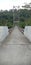 A breathtaking photograph of a majestic suspension bridge spanning over a river,