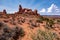 Breathtaking sandstone formations in Arches National Park on blue cloudy sky background in Utah