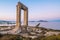 Breathtaking scenery on ancient portal of Apollo Temple at dawn in Greek Naxos island. Beautiful landscape and light background.