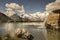 Breathtaking scenery of a lake and a waterfall on the side  in Saas-Grund, Switzerland