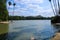 A breathtaking shot of the waters and the lush green trees at Lake Evans at Fairmount Park in Riverside California