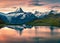 Breathtaking summer sunrise on Bachalpsee lake with Schreckhorn and Wetterhorn peaks on background.