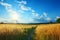 Breathtaking sunrise over serene countryside with vibrant wheat fields and clear blue sky