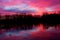 Breathtaking sunset reflecting its radiant colors in the lake