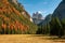 Breathtaking view of famous Tre Cime di Lavaredo from Landro Valley at sunny autumn day, Dolomite Alps, Italy