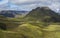 Breathtaking view on Landscape of Godland and thorsmork with rugged green moss covered hill and Eyjafjallajokull glacier