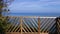 A breathtaking view of the Mediterranean sea from a balcony with a wooden railing Pesaro, Italy