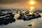 Breathtaking view of mudflat of the Waddenzee during low tide under amazing sunset sky with clouds