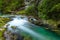 Breathtaking view over colorful Radovna river in Vintgar Gorge, Slovenia. Long exposure.