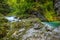 Breathtaking view over colorful Radovna river in Vintgar Gorge, Slovenia. Long exposure.