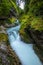 Breathtaking view over colorful Radovna river in Vintgar Gorge, Slovenia. Long exposure.