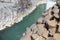 Breathtaking view of Studlagil canyon in Jokuldalur Valley in Iceland. Basalt columns and turquoise glacier river