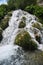 Breathtaking waterfalls panorama in Plitvice Lakes National Park, Croatia, Europe. Majestic view with turquoise water and sunset