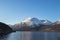 Breathtaking wildlife of the northernmost part of Norway, Finnmark. Snow-capped hills along with Balsfjorden Bay. The Scandinavian