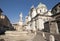 BRECSIA, LOMBARDY, ITALY - February 14, 2018 Square of Paolo VI with baroque fountain, new and old roman dome churches in Brescia