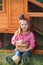 Breeder hens kid girl rancher farmer with chicks in chicken coop