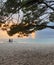 Brela.  Croatia - June 5, 2019: A traveling couple, a man and a woman are sitting on a sun lounger by the sea in the evening