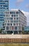 Bremen, Germany - September 14th, 2017 - Modern hotel building with waterfront sidewalk