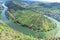 Bremm, Germany - 08 20 2020: view from the Calmont to the Mosel curve with Kloster Stuben