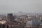 Brescia cityscape, buildings in fog, Lombardy, Italy