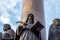 BREST, BELARUS - OCTOBER 19, 2019: The statue of  Ð¡hronicler on Millennium Monument against blue sky.