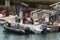 BREST, FRANCE â€“ JUNE 01, 2019 : Family in a boat moored at a pontoon